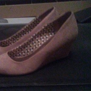 Never worn, size 6 wedges.
